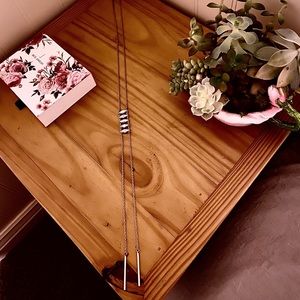 Long horizontal diamond shape necklace